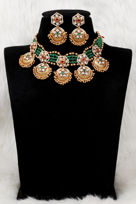 Regal Kundan Gold Necklace Set with Green Beads