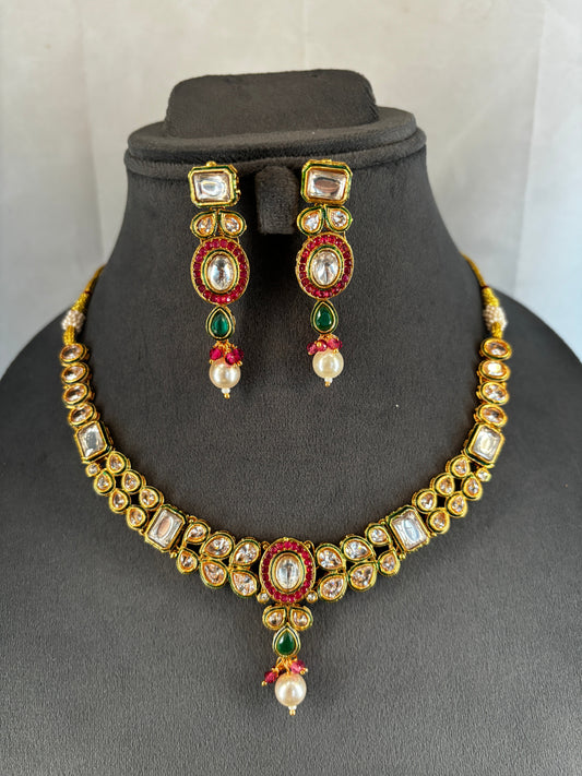 Elegant Kundan Necklace with Red and Green Enamel Work